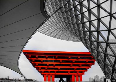Red China Art Museum framed by modern black and white architecture